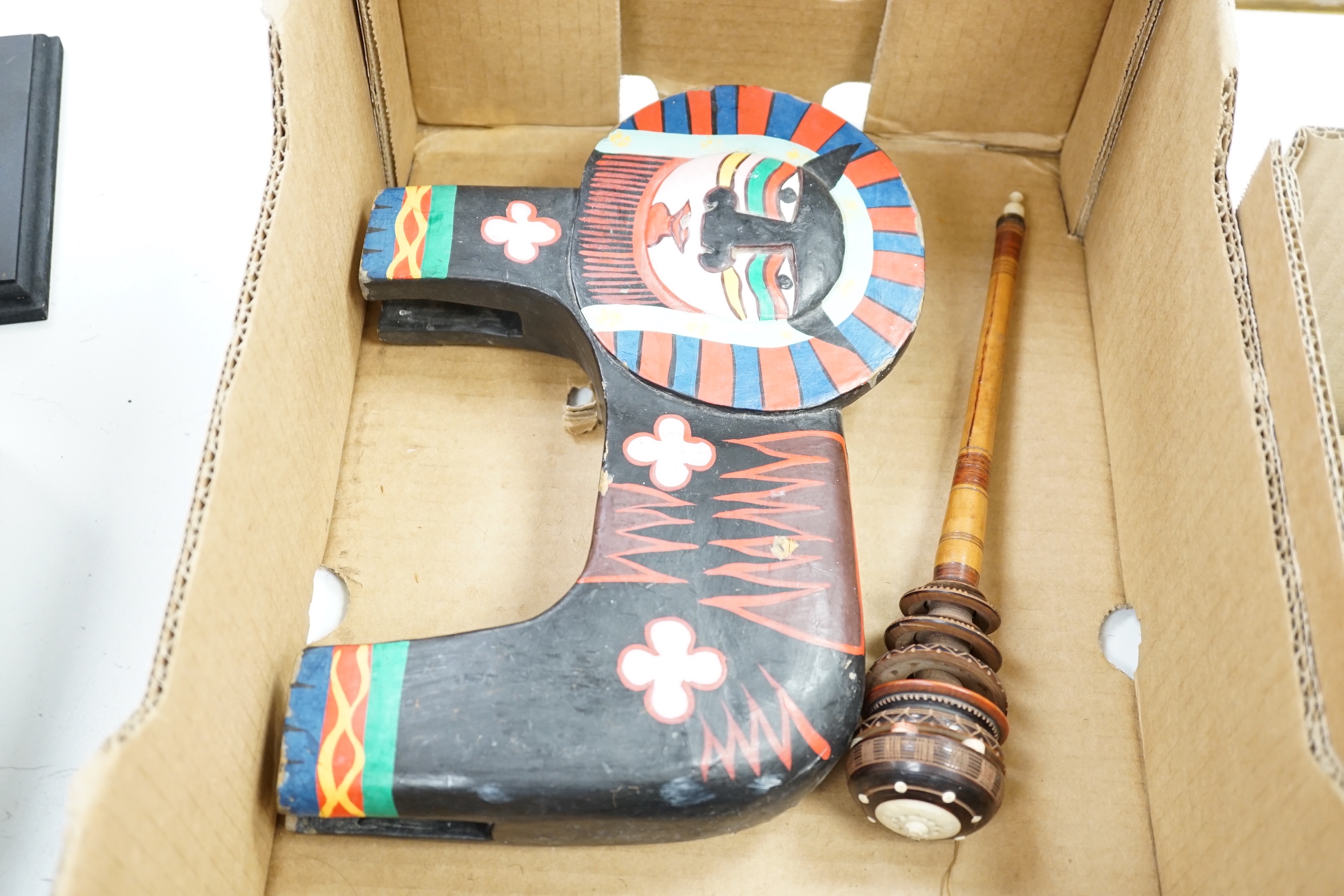 Two Aboriginal boomerangs, an African mask, a painted lion figure and four other items (8)